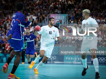 Abdelrahman ABDOU of the Egypt Team is playing during the men's Handball Preliminary Round - Group B match between France and Egypt in Paris...