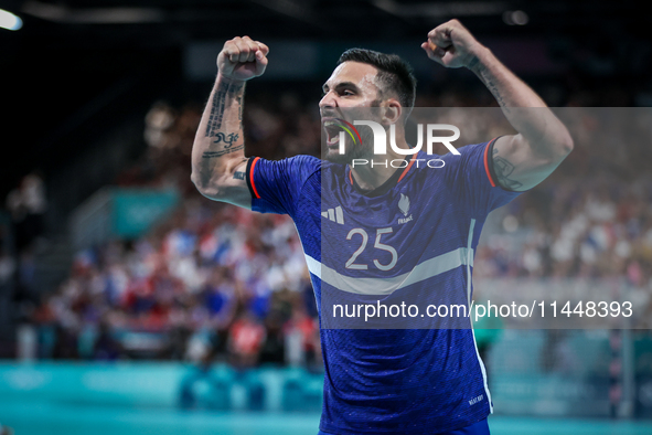 Hugo Descat of the France team is celebrating during the men's handball preliminary round - Group B match between France and Egypt in Paris,...