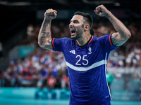 Hugo Descat of the France team is celebrating during the men's handball preliminary round - Group B match between France and Egypt in Paris,...