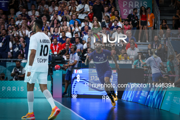 Hugo Descat of the France Team is celebrating during the men's Handball Preliminary Round - Group B match between France and Egypt in Paris,...