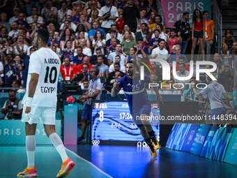 Hugo Descat of the France Team is celebrating during the men's Handball Preliminary Round - Group B match between France and Egypt in Paris,...