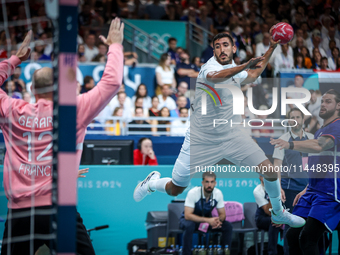 Yahia OMAR of the Egypt team is shooting the ball during the Men's Preliminary Round Group B match between France and Egypt on day five of t...