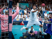 Yahia OMAR of the Egypt team is shooting the ball during the Men's Preliminary Round Group B match between France and Egypt on day five of t...