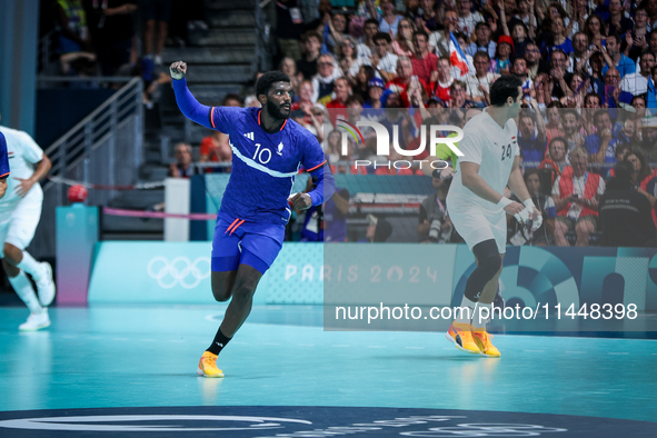 Dika MEM of the France Team is celebrating during the men's Handball Preliminary Round - Group B match between France and Egypt in Paris, Fr...