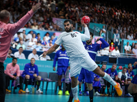 Ahmed ADEL of the Egypt team is shooting the ball during the Men's Preliminary Round Group B match between France and Egypt in Paris, France...