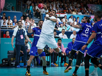 Yehia ELDERAA of the Egypt team is shooting the ball during the Men's Preliminary Round Group B match between France and Egypt on day five o...