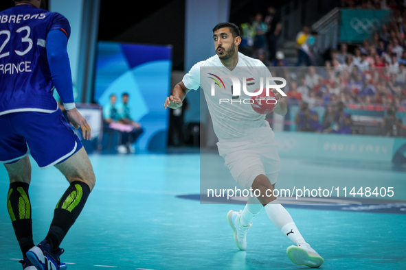 Yahia OMAR of the Egypt team is playing during the Men's Preliminary Round Group B match between France and Egypt in Paris, France, on July...