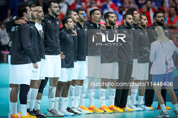 The Egypt team is standing before the Men's Preliminary Round Group B match between France and Egypt in Paris, France, on July 31, 2024, at...