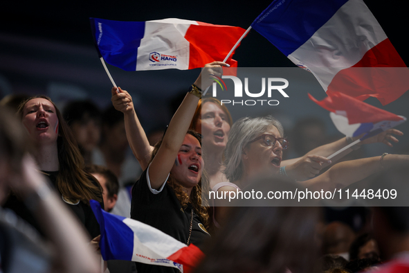 Fans of the France team are gathering before the Men's Preliminary Round Group B match between France and Egypt on day five of the Olympic G...