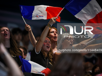 Fans of the France team are gathering before the Men's Preliminary Round Group B match between France and Egypt on day five of the Olympic G...