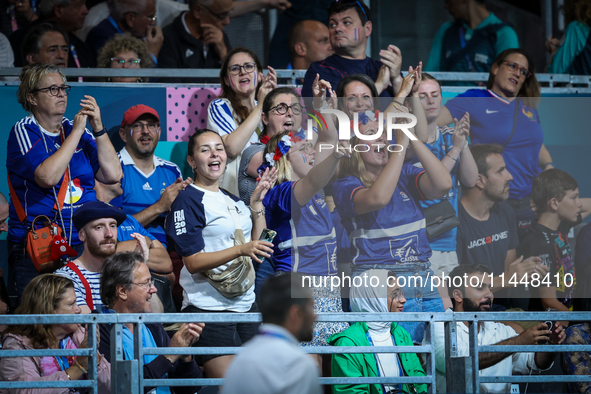 Fans of the France team are gathering before the Men's Preliminary Round Group B match between France and Egypt on day five of the Olympic G...