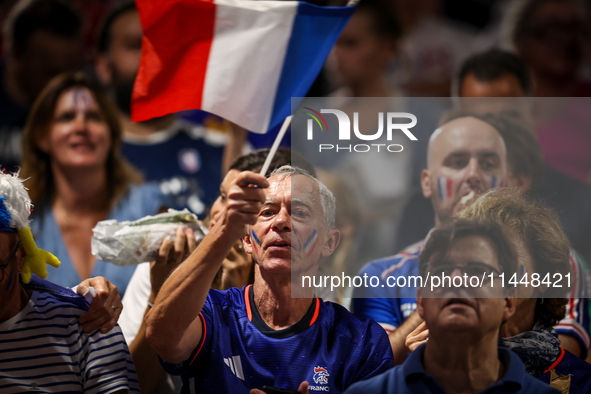 Fans of the France team are gathering before the Men's Preliminary Round Group B match between France and Egypt on day five of the Olympic G...