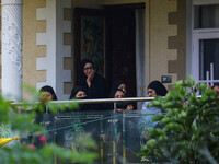 Kashmiri Shiite Muslim mourners are watching a religious procession on the 25th day of the Islamic month of Muharram in Srinagar, Jammu and...