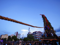 Nepali devotees are pulling the chariot of the Red God, Rato Macchindranath, to the resting point as it approaches the final tour of the cit...