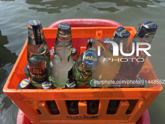 Cool drinks are being served at a snack stand along Sambranikodi Island in Kerala, India, on April 06, 2024. (