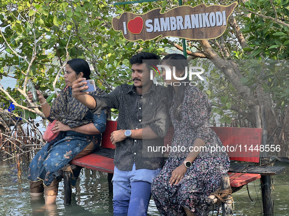 Indian tourists are taking selfies as they visit Sambranikodi Island in Kerala, India, on April 06, 2024. Sambranikodi Island is situated at...