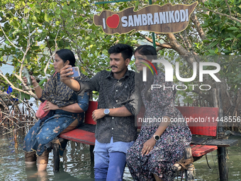 Indian tourists are taking selfies as they visit Sambranikodi Island in Kerala, India, on April 06, 2024. Sambranikodi Island is situated at...