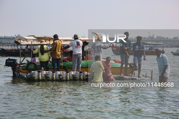 Boats are bringing Indian tourists to Sambranikodi Island in Kerala, India, on April 06, 2024. Sambranikodi Island is situated at the southe...