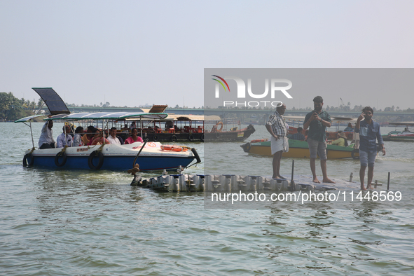 Boats are bringing Indian tourists to Sambranikodi Island in Kerala, India, on April 06, 2024. Sambranikodi Island is situated at the southe...