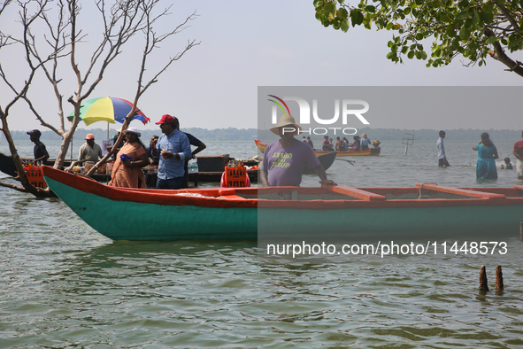 A boatman is waiting for Indian tourists to hire his services at Sambranikodi Island in Kerala, India, on April 06, 2024. Sambranikodi Islan...