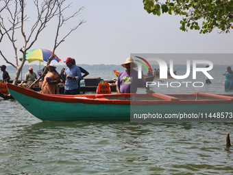 A boatman is waiting for Indian tourists to hire his services at Sambranikodi Island in Kerala, India, on April 06, 2024. Sambranikodi Islan...