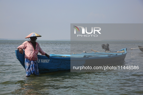 A boatman is waiting for Indian tourists to hire his services at Sambranikodi Island in Kerala, India, on April 06, 2024. Sambranikodi Islan...