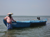 A boatman is waiting for Indian tourists to hire his services at Sambranikodi Island in Kerala, India, on April 06, 2024. Sambranikodi Islan...