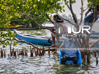 A security guard is sitting on a chair at Sambranikodi Island in Kerala, India, on April 06, 2024. Sambranikodi Island is situated at the so...