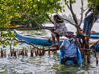 A security guard is sitting on a chair at Sambranikodi Island in Kerala, India, on April 06, 2024. Sambranikodi Island is situated at the so...