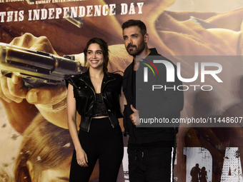 Indian actors (L) Sharvari and (R) John Abraham are posing for a photoshoot during a movie Vedaa trailer launch event in Mumbai, India, on A...