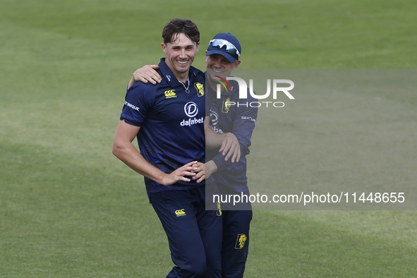 Durham's Paul Coughlin (L) and Scott Borthwick (R) are celebrating a wicket during the Metro Bank One Day Cup match between Durham County Cr...