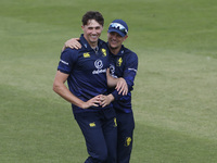 Durham's Paul Coughlin (L) and Scott Borthwick (R) are celebrating a wicket during the Metro Bank One Day Cup match between Durham County Cr...