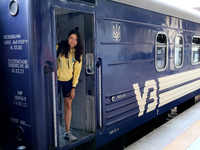 Ukrainian epee fencer Vlada Kharkova is emerging from the carriage at the Kyiv-Pasazhyrskyi railway station upon returning from the Paris 20...