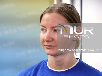 Ukrainian epee fencer Olena Kryvytska is being pictured upon returning from the Paris 2024 Olympic Games in Kyiv, Ukraine, on August 1, 2024...