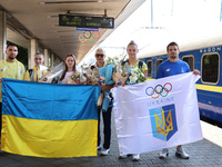 Ukrainian judoka Dilshot Khalmatov, coach Yuliia Kaiukova, Ukrainian artistic gymnast Anna Lashchevska, coach Svitlana Kuznietsova, and Ukra...