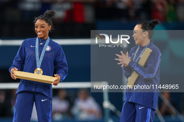  Gold medalist and winner Simone Biles  of USA and bronze medalist Suni Lee of USA  are posing  during the Artistic Gymnastics Women's All-A...