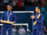  Gold medalist and winner Simone Biles  of USA and bronze medalist Suni Lee of USA  are posing  during the Artistic Gymnastics Women's All-A...