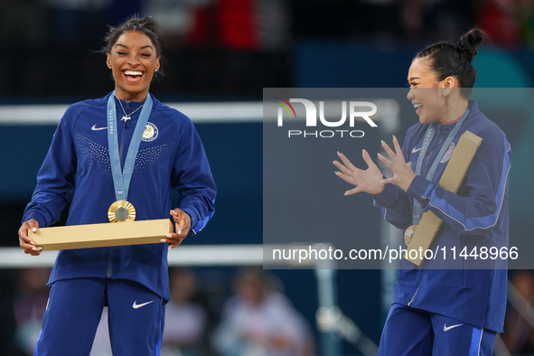  Gold medalist and winner Simone Biles  of USA and bronze medalist Suni Lee of USA  are posing  during the Artistic Gymnastics Women's All-A...