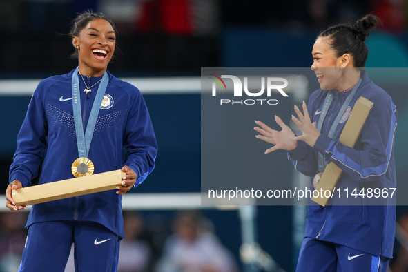  Gold medalist and winner Simone Biles  of USA and bronze medalist Suni Lee of USA  are posing  during the Artistic Gymnastics Women's All-A...