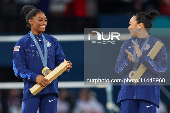  Gold medalist and winner Simone Biles  of USA and bronze medalist Suni Lee of USA  are posing  during the Artistic Gymnastics Women's All-A...