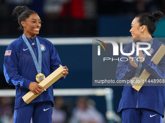  Gold medalist and winner Simone Biles  of USA and bronze medalist Suni Lee of USA  are posing  during the Artistic Gymnastics Women's All-A...