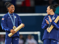  Gold medalist and winner Simone Biles  of USA and bronze medalist Suni Lee of USA  are posing  during the Artistic Gymnastics Women's All-A...