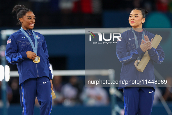  Gold medalist and winner Simone Biles  of USA and bronze medalist Suni Lee of USA  are posing  during the Artistic Gymnastics Women's All-A...