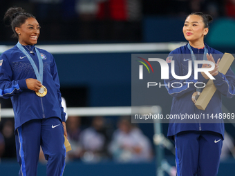  Gold medalist and winner Simone Biles  of USA and bronze medalist Suni Lee of USA  are posing  during the Artistic Gymnastics Women's All-A...