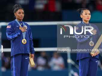  Gold medalist and winner Simone Biles  of USA and bronze medalist Suni Lee of USA  are posing  during the Artistic Gymnastics Women's All-A...