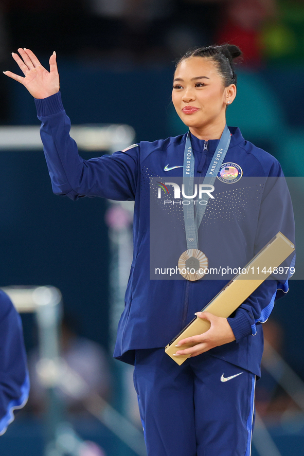 Bronze medalist Suni Lee of USA  are posing  during the Artistic Gymnastics Women's All-Around Final medal ceremony on day six of the Olympi...