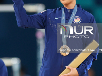 Bronze medalist Suni Lee of USA  are posing  during the Artistic Gymnastics Women's All-Around Final medal ceremony on day six of the Olympi...