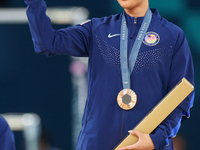 Bronze medalist Suni Lee of USA  are posing  during the Artistic Gymnastics Women's All-Around Final medal ceremony on day six of the Olympi...