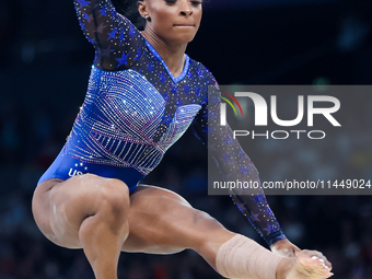 Simone Biles of Team United States competes on the balance beam during the Artistic Gymnastics Women's All-Around Final on day six of the Ol...