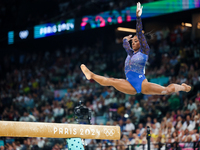 Simone Biles of Team United States competes on the balance beam during the Artistic Gymnastics Women's All-Around Final on day six of the Ol...